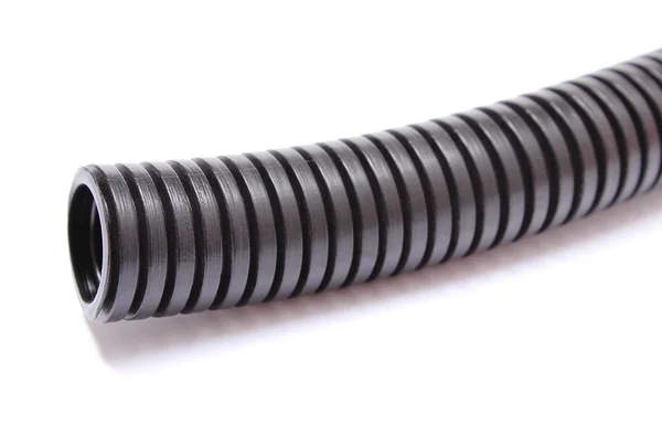 Гофрированная труба для кабеля электрического напряжения — стоковое фото